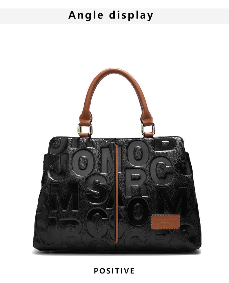 Luxury Black Leather Handbag – Elegant & Spacious Everyday Bag